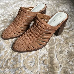 1. State brown leather mules